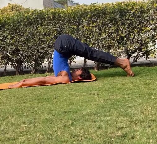Halasana (Plough Pose): Yoga Asana for Strength & Vitality.